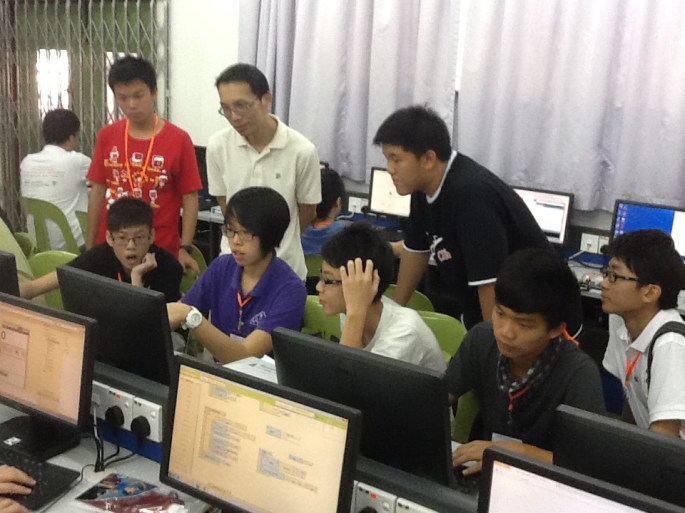 Students Showing Their Android App to Dr Chia